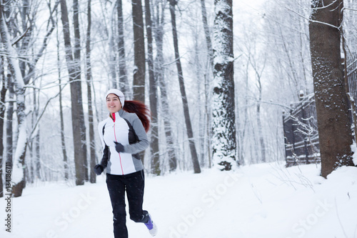 Photo of young sportswoman running