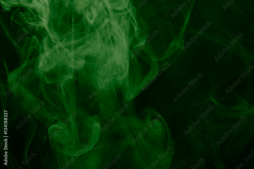 Cloud of smoke on black background. Selective focus. Toned Cloud of smoke on black background. Selective focus. Toned