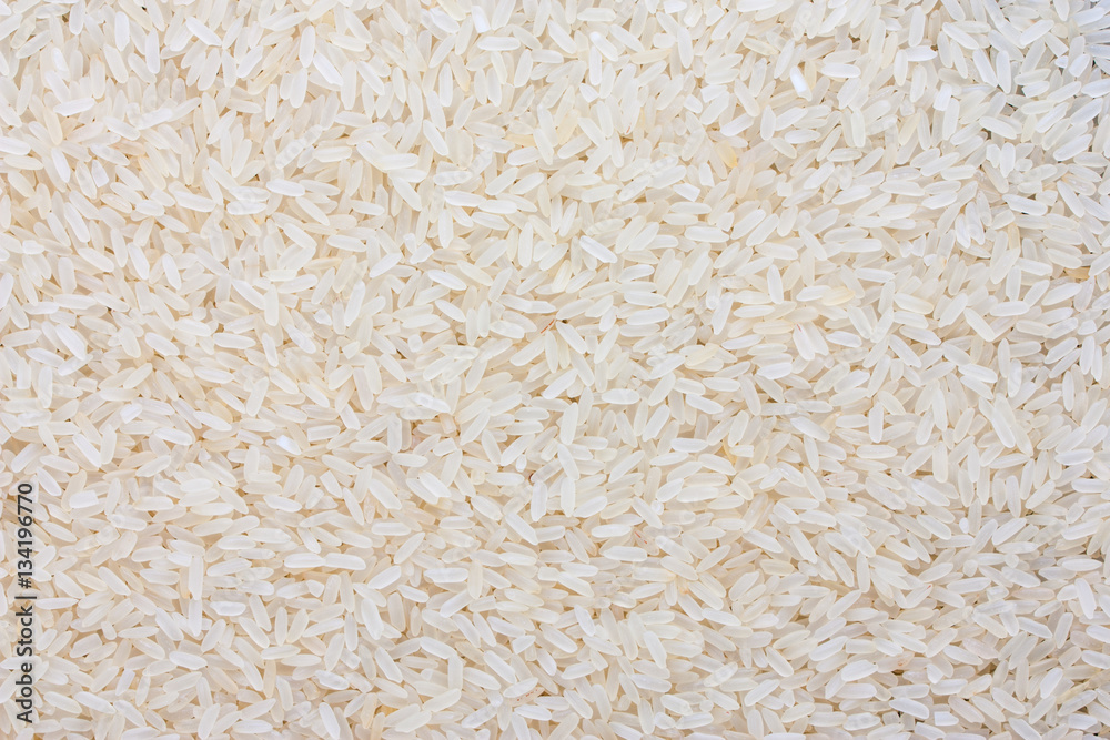 Grains of white parboiled rice, Background Grains of white parboiled rice, Background