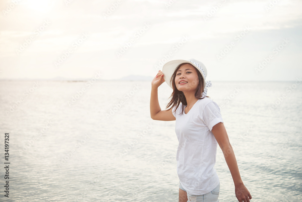 Young beautiful woman relaxing enjoy with the beach. Women lifes Young beautiful woman relaxing enjoy with the beach. Women lifes