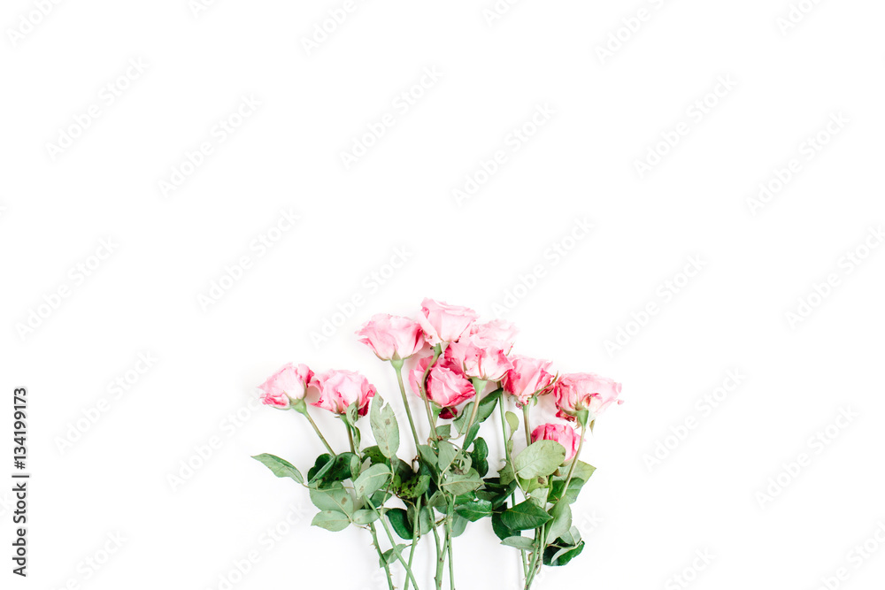 Pink roses bouquet on white background. Flat lay, top view. Valentine's background. Pink roses bouquet on white background. Flat lay, top view. Valentine's background.