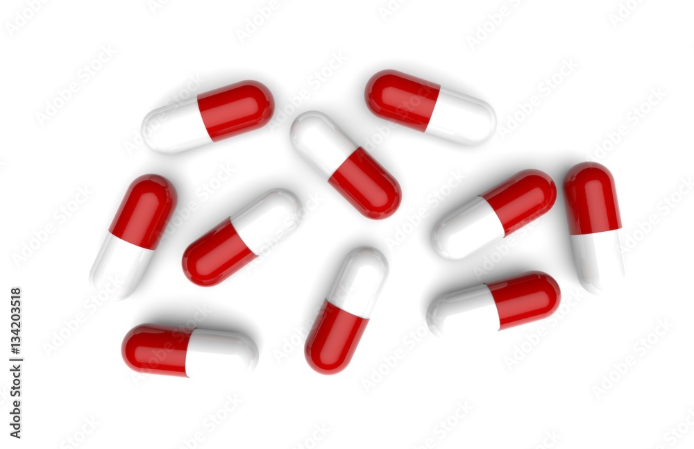 Overhead view of many red and white drug capsules isolated on white background Overhead view of many red and white drug capsules isolated on white background