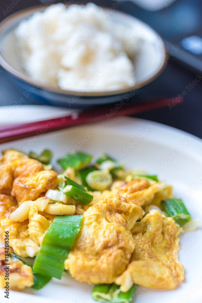 the Thai style omelet mixed with Japanese onion bunch serve wit the Thai style omelet mixed with Japanese onion bunch serve wit