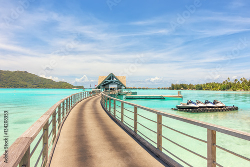 Over water bungalows into amazing green lagoon at Bora Bora isla
