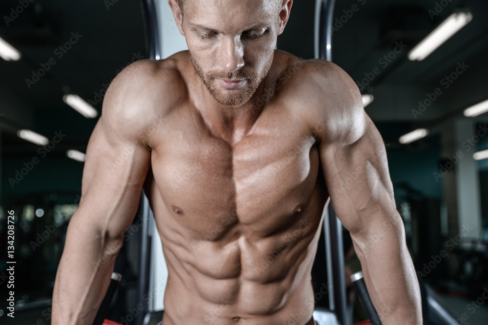 Strong and handsome athletic young man muscles abs and biceps. Strong and handsome athletic young man muscles abs and biceps.
