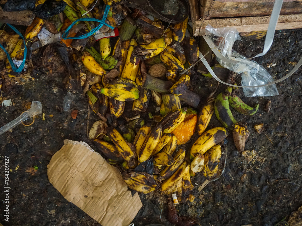 Waste of rotten Bananas abandoned on the ground  traditional market in jakarta indonesia
