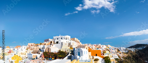 Panorama of Oia village with colorful houses , view of Oia town, Santorini island, Greece