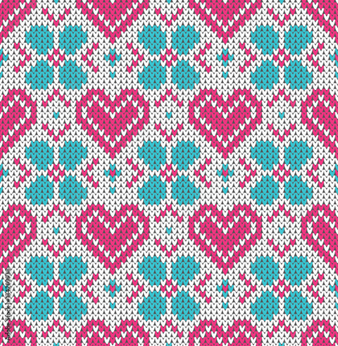 Seamless pattern on the theme of holiday Valentine's Day with an image of the Norwegian and fairisle patterns. Pink hearts on a white background. Wool knitted texture. Vector Illustration.