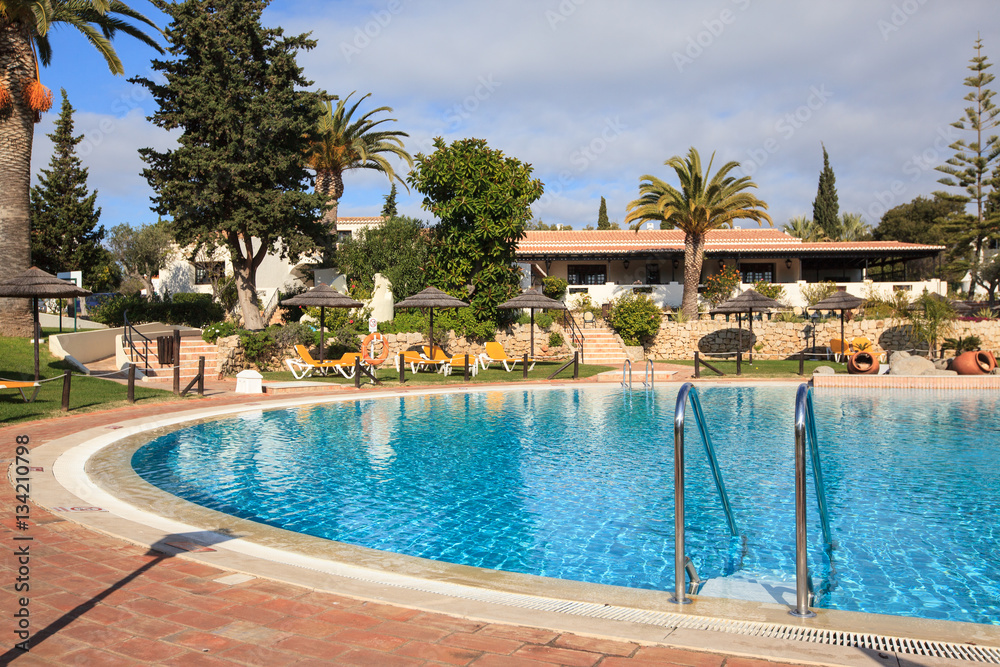 Outdoor swimming pool in luxury resort 

