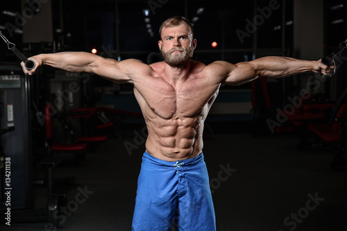 brutal muscular man with beard unshaven fitness model healthcare