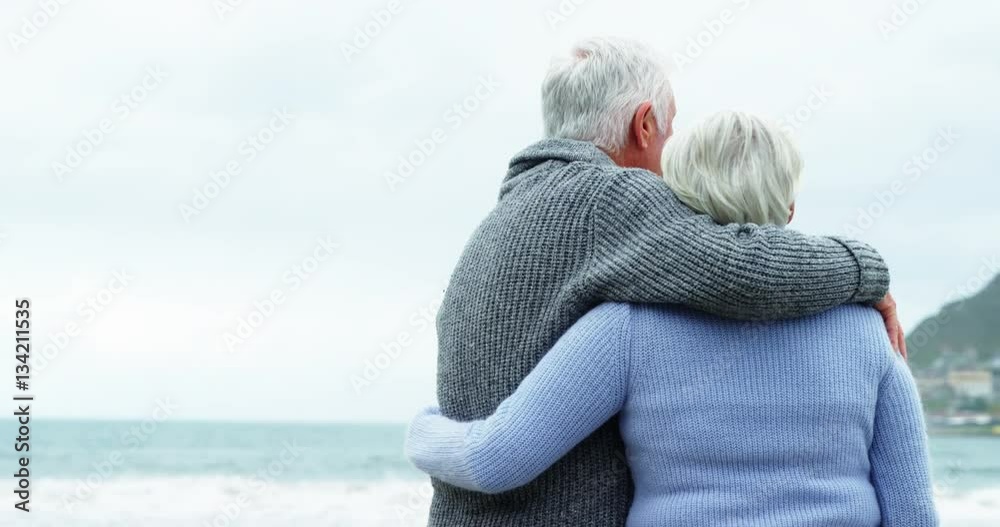 Happy senior couple looking at sea Happy senior couple looking at sea