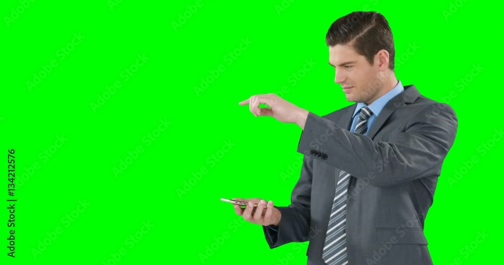 Young businessman gesturing while using mobile phone Young businessman gesturing while using mobile phone