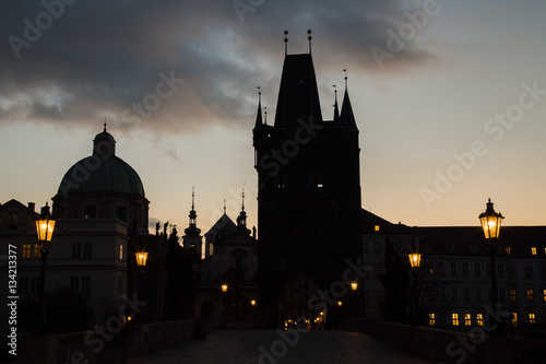 Sunrise in Prague  Charles Bridge  silhouette of towers.