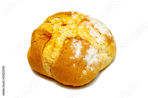 Homemade round bread from wheat flour, isolated.