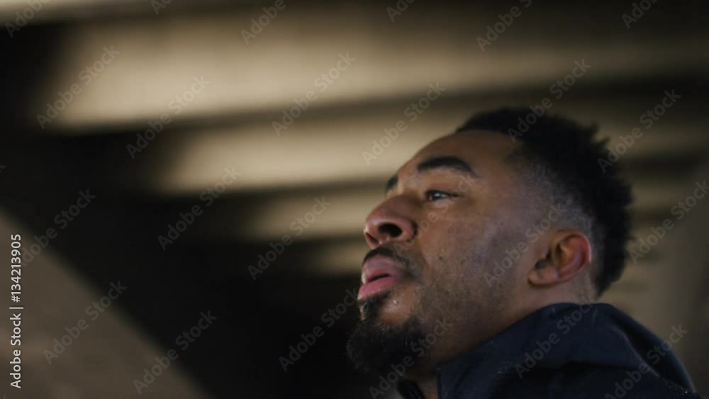 4K Male athlete stands up breathless after a workout 4K Male athlete stands up breathless after a workout