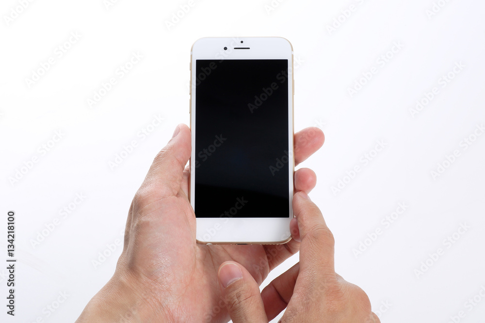 Male hands using white smartphone Male hands using white smartphone