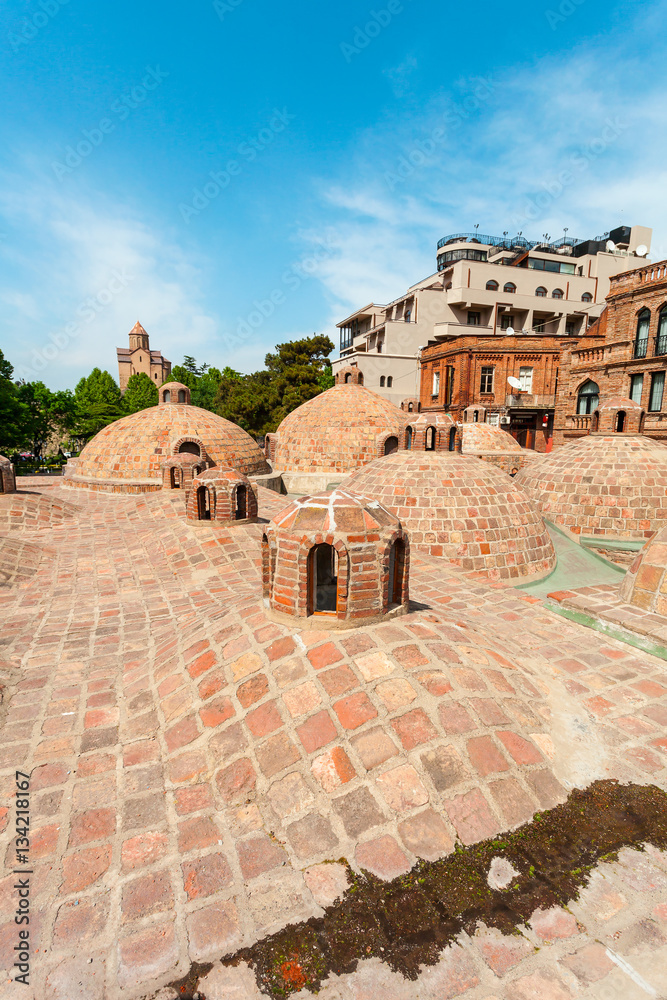 Abanotubani - ancient district of Tbilisi, Georgia, known for its sulfuric baths. The roof with dome of red brick of steam rooms.
