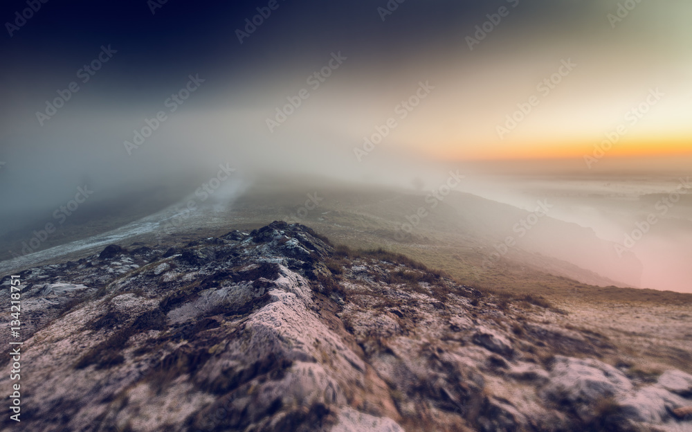Frosty Hill Capped in Morning Fog and Dawning Sky Frosty Hill Capped in Morning Fog and Dawning Sky