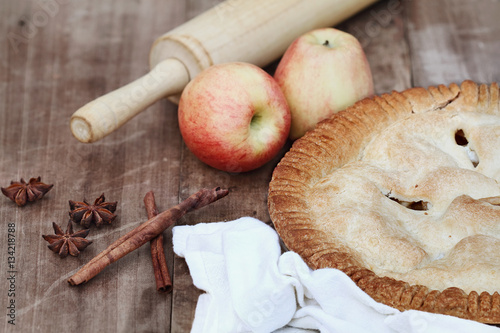 Apple Pie with Rolling Pin and Ingredients photo