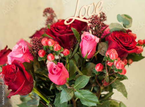 A bouquet of flowers and gifts for the holiday  for lovers  rose for women.