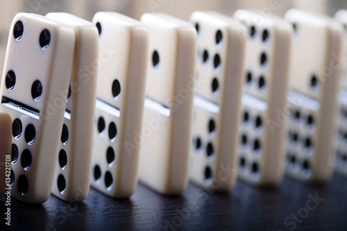 Close-up of domino game on black background photo