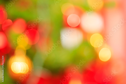 Abstract blurred of blue and silver and green and red glittering shine bulbs lights background:blur of.
