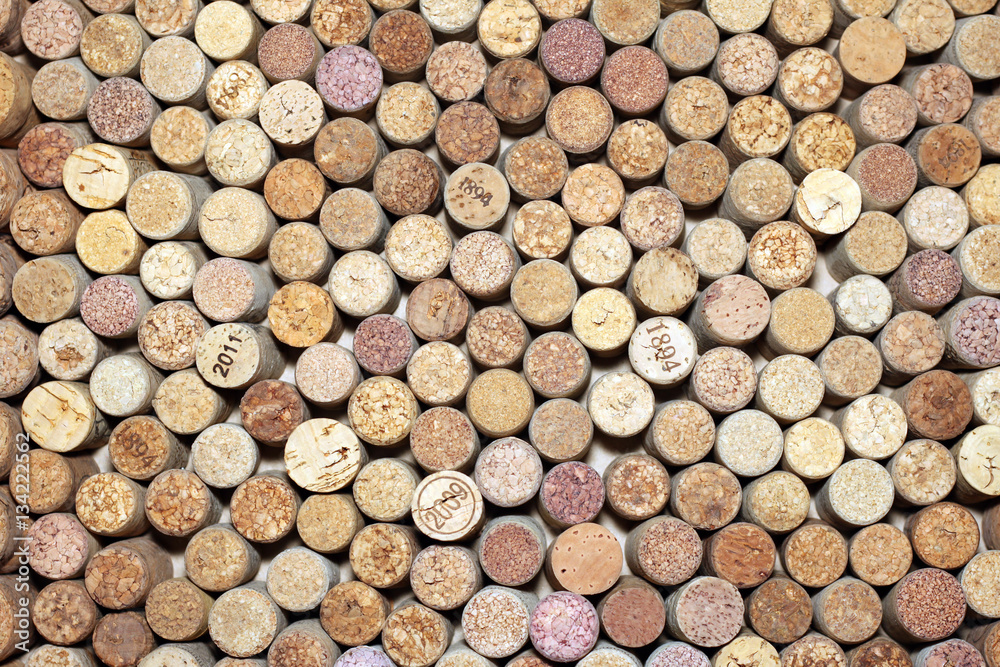 Background of used wine corks. Wall of many different wine corks. Closeup of wine corks. Background of used wine corks. Wall of many different wine corks. Closeup of wine corks.
