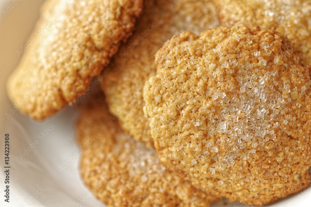 Close-up view of homemade cookies. Macro photo of bakery oat cake. Oatmeal cookies on white plate. Close-up view of homemade cookies. Macro photo of bakery oat cake. Oatmeal cookies on white plate.