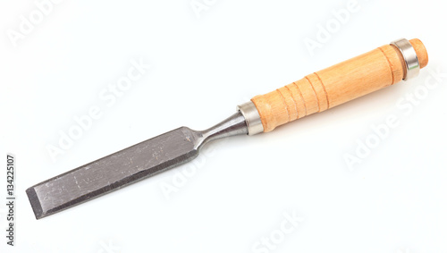 Metal chisel on white background