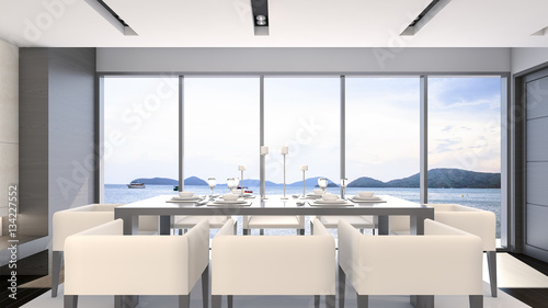 Sea view dining room with luxury table set / 3D Rendering © Worawuth