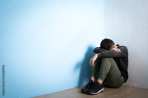 depression man sit on floor