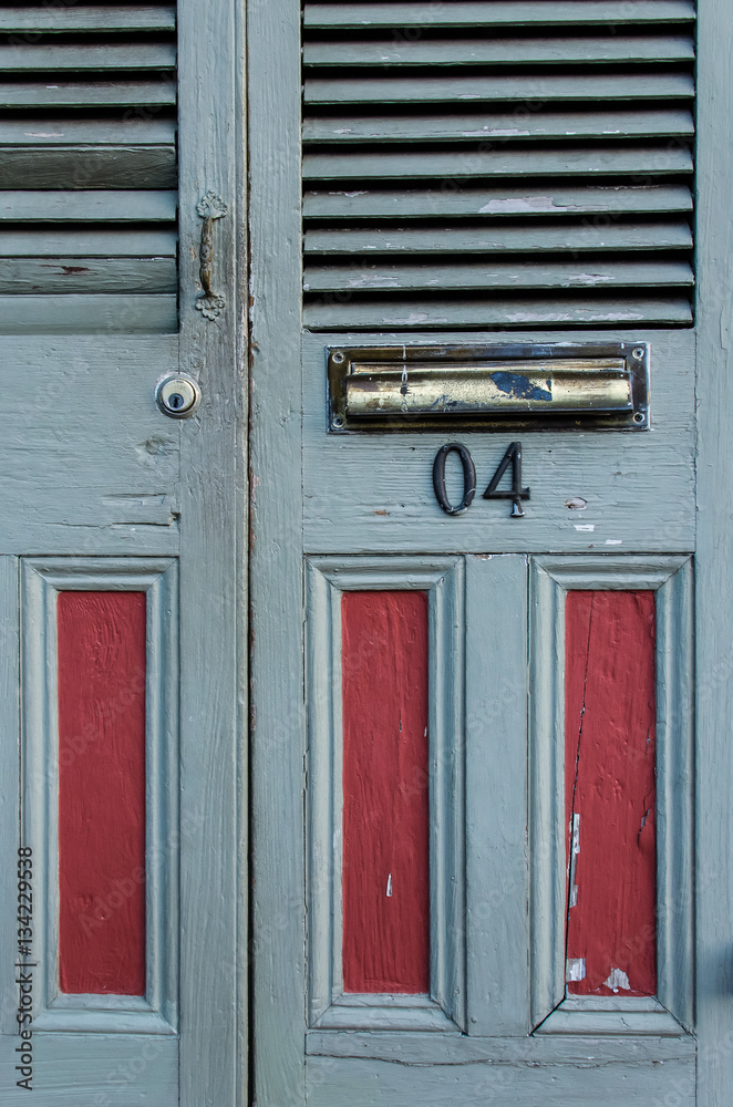 Slate grey and burgundy red door with number on it and mail slot Slate grey and burgundy red door with number on it and mail slot