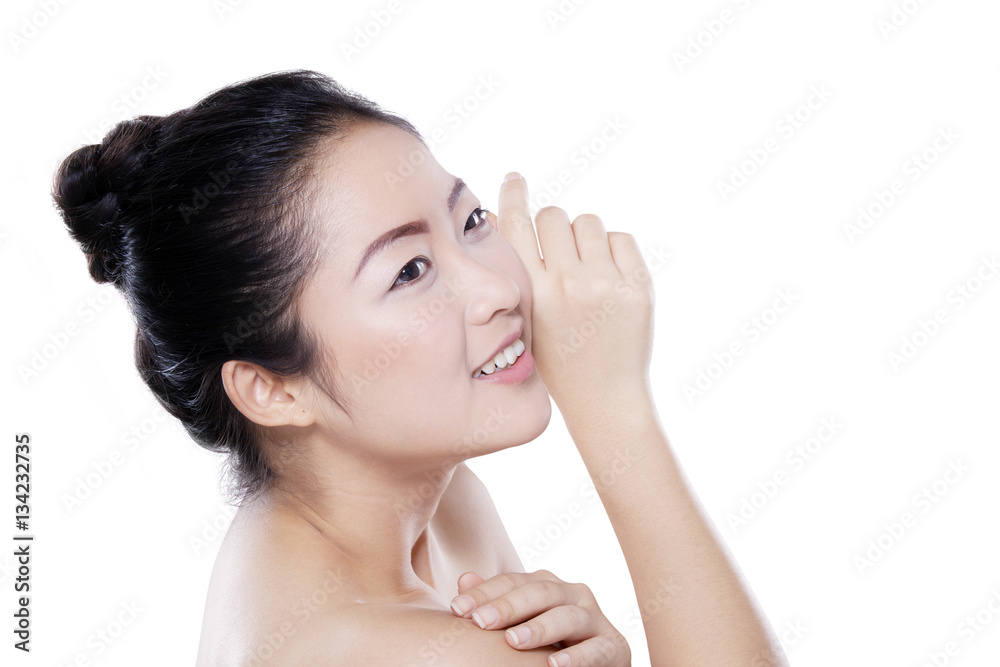 Asian model smiling in studio