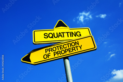 Squatting vs Protection of Property - Traffic sign with two options - freedom to use abandoned flat, house and building vs to protect private possession. Adverse possession vs crime against landlord