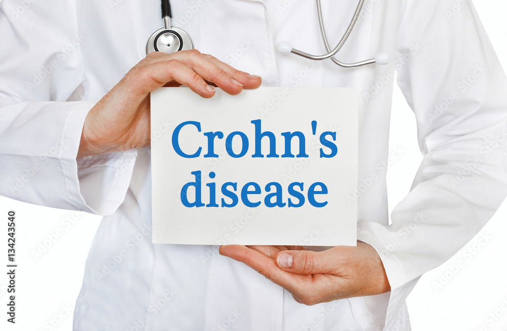 Crohn's disease card in hands of Medical Doctor Crohn's disease card in hands of Medical Doctor