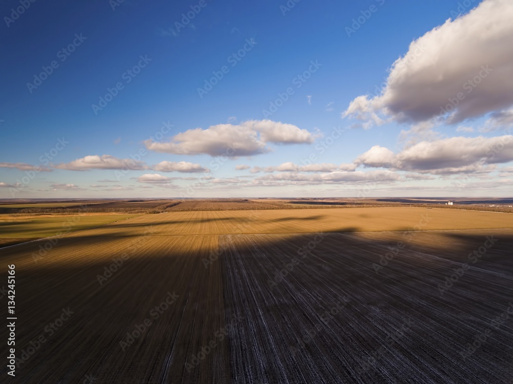 Countryside with fields in winter time. Aerial view.