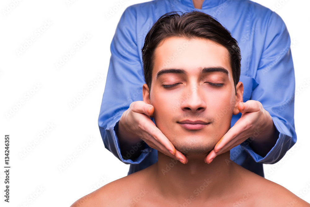 Man during massage session isolated on white Stock Photo Adobe Stock