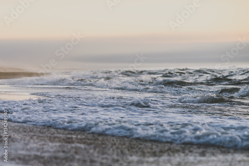 Billede på lærred Sunset in the empty beach in Curonian Spit, Neringa, Lithuania
