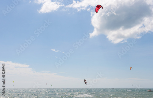 Kitesurfer jumping on beautiful background