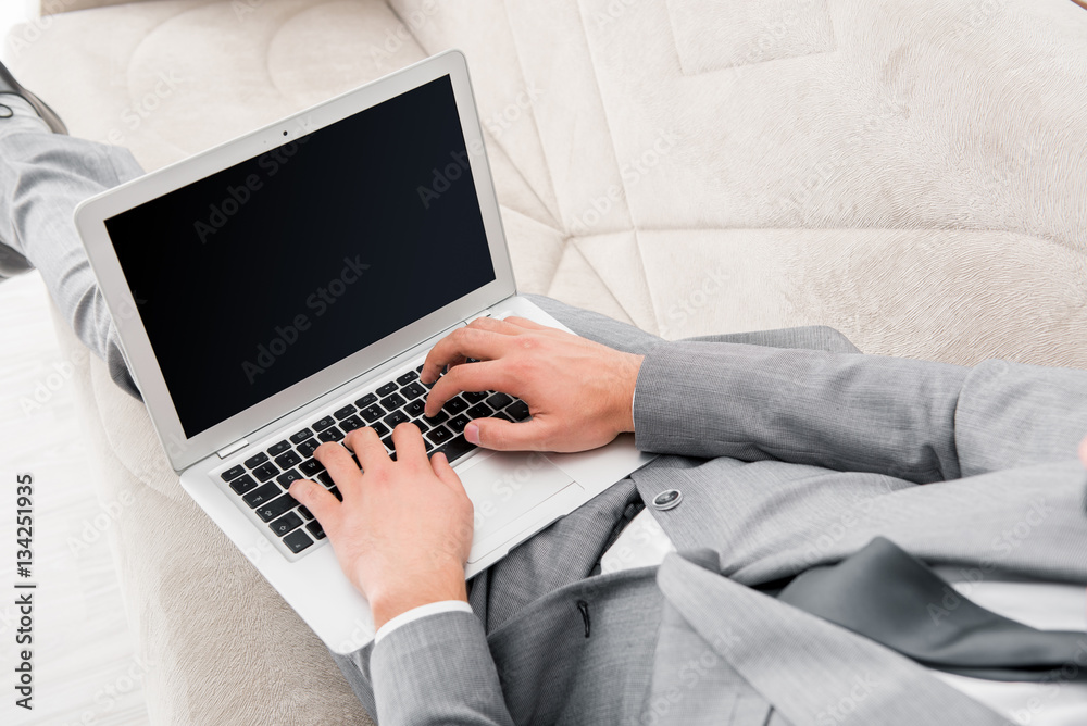 Businessman working with laptop in business concept Businessman working with laptop in business concept