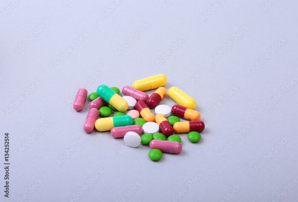 Pills and medical thermometer on white background. . Pills and medical thermometer on white background. .
