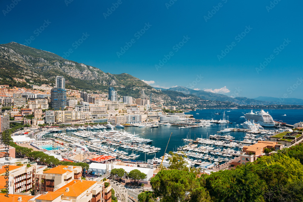 Monaco, Monte Carlo cityscape. Real estate architecture on mountain hill background