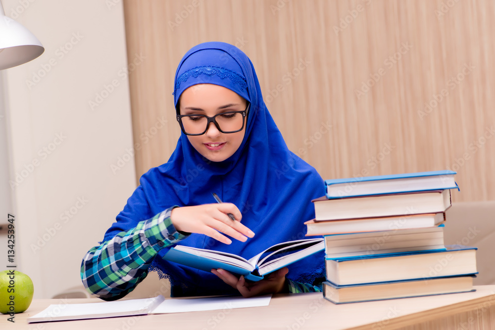 Muslim girl preparing for entry exams