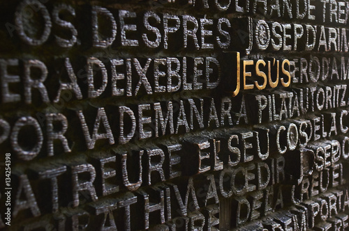 Barcelona, Spain - November 18, 2016: Jesus name written on the main door of the Passion facade of The Temple of the Sagrada Familia. Work by Josep Maria Subirachs.