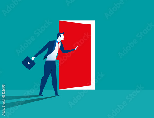 Businessman opening door