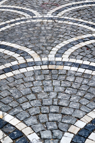 old city cobblestone pavement with a geometric pattern of stones of different colors