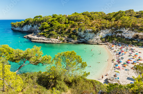 Cala Llombards. Beautiful sandy beach that is sheltered on either side by cliffs. Mallorca island, Spain.