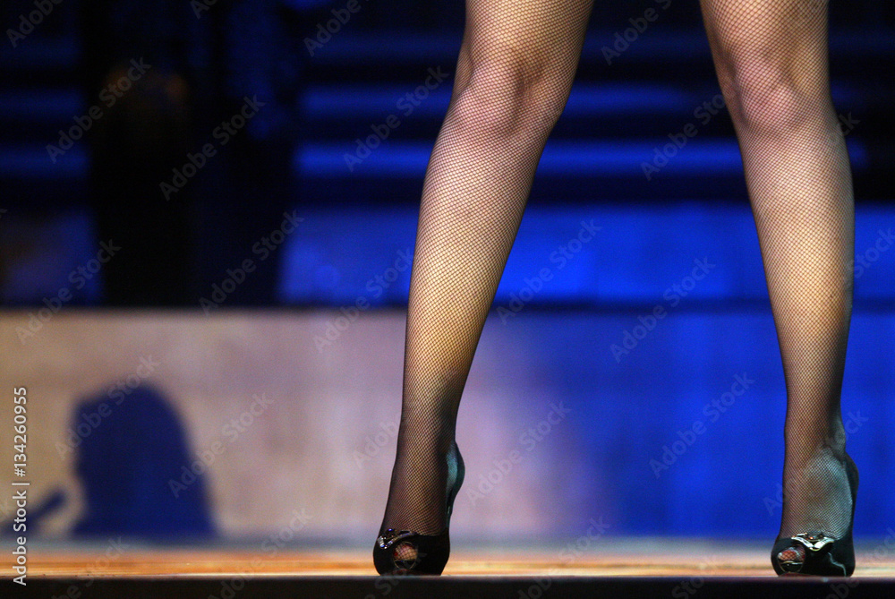 Woman's legs and shadow Woman's legs and shadow