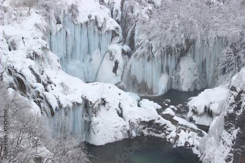 Frozen waterfalls on Plitvice lakes, National park in Croatia. Winter scene.  © Simun Ascic