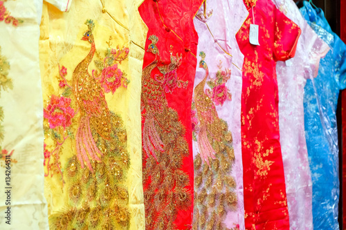 Qipao (Cheongsam dress or Chinese dress) for woman in Chinatown (Yaowarat Road) for sale to customers during the festival is Chinese New Year.